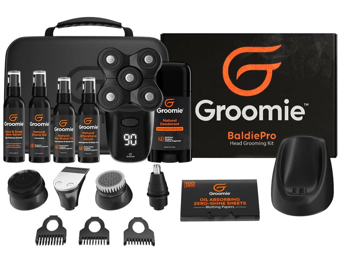 Complete Groomie grooming kit with BaldiePro shaver, trimmer, and skincare products